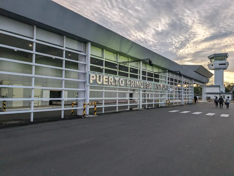 Puerto Princesa Airport terminal building exterior with control tower in Palawan, Philippines