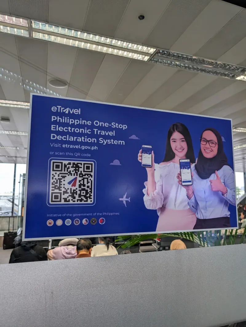Philippine eTravel declaration system sign with QR code