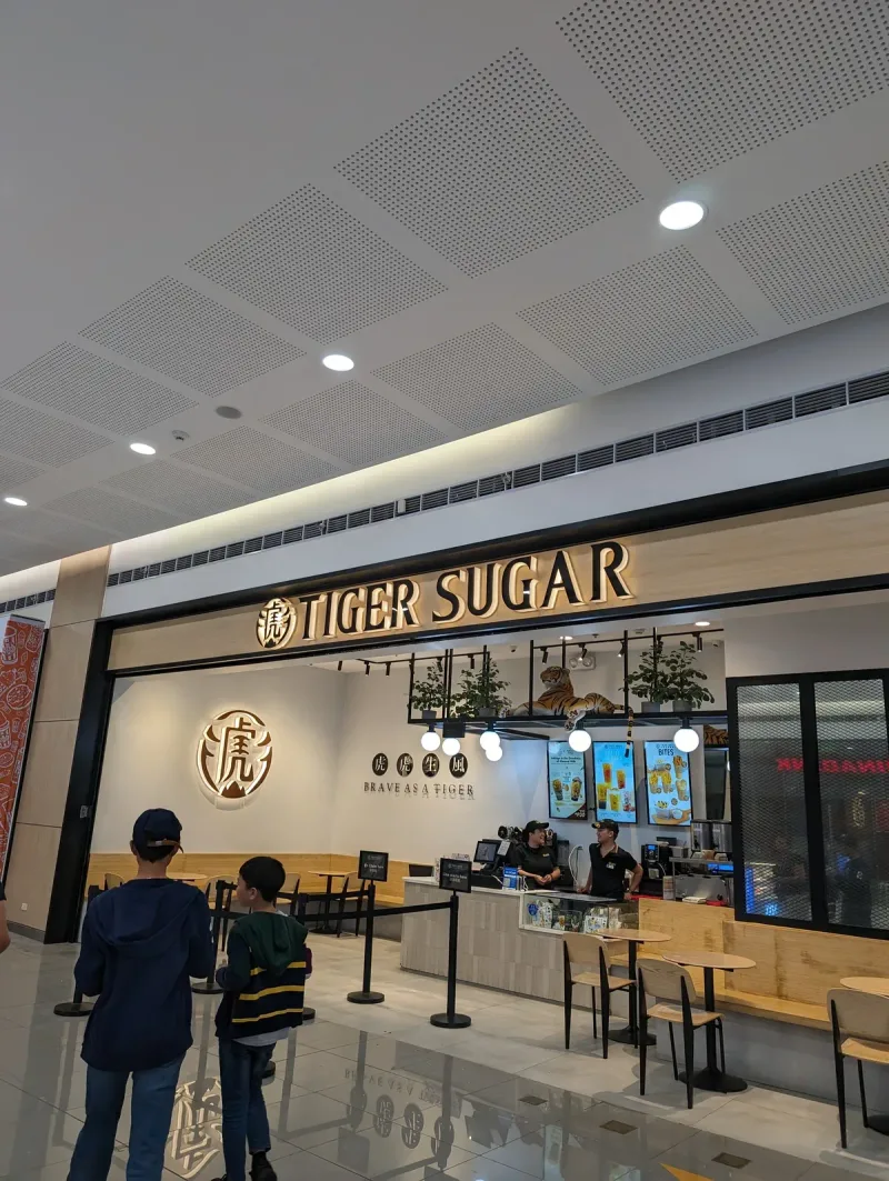 Tiger Sugar bubble tea shop in a brightly lit mall